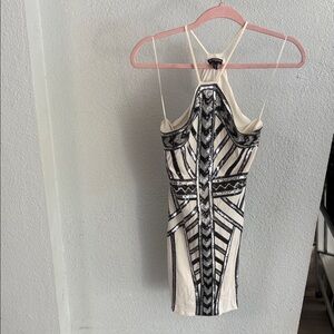 Elegant Express Ivory and Black Sequin Dress